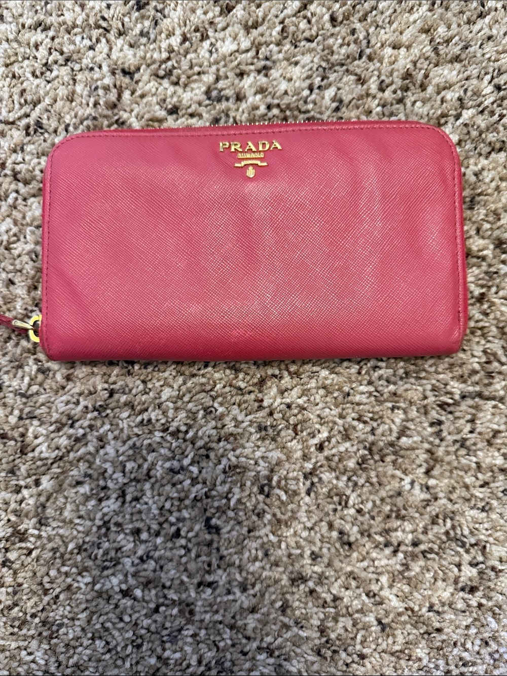 Prada Zip-Around Saffiano Wallet in Rose Pink with Gold Logo, gently used.